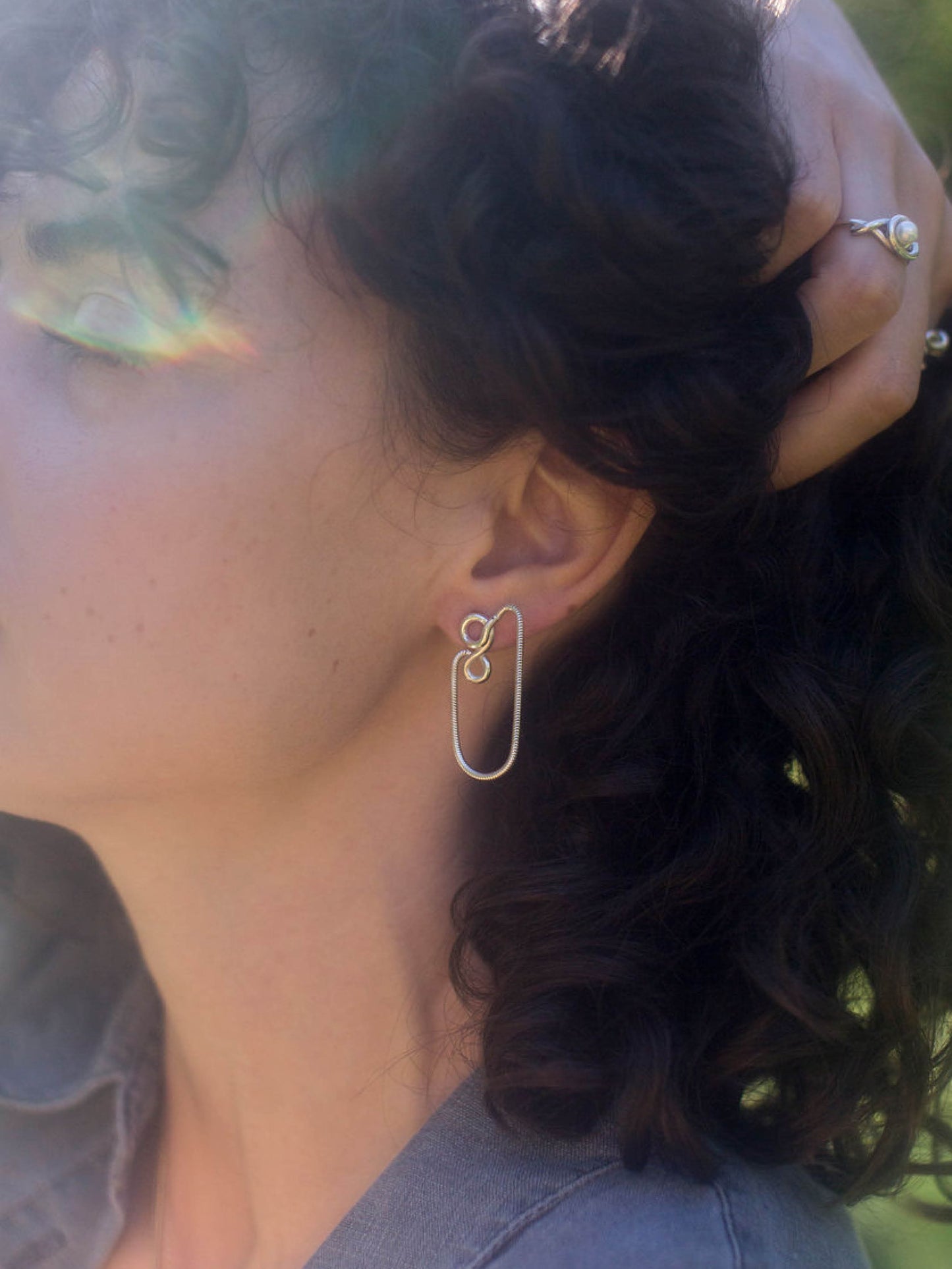 Les boucles d'oreilles Olé