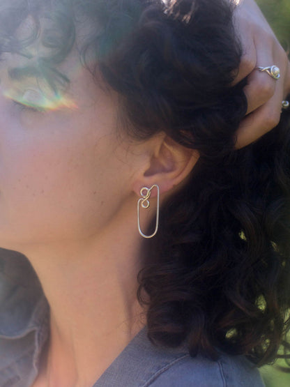 Les boucles d'oreilles Olé