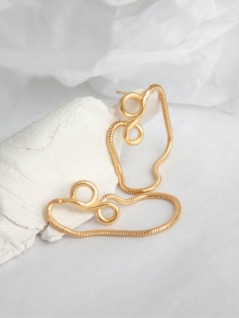 Les boucles d'oreilles Olé